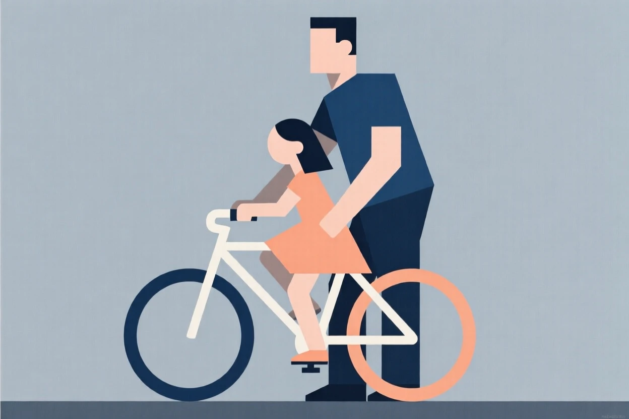 A father teaching his daughter to ride a bike