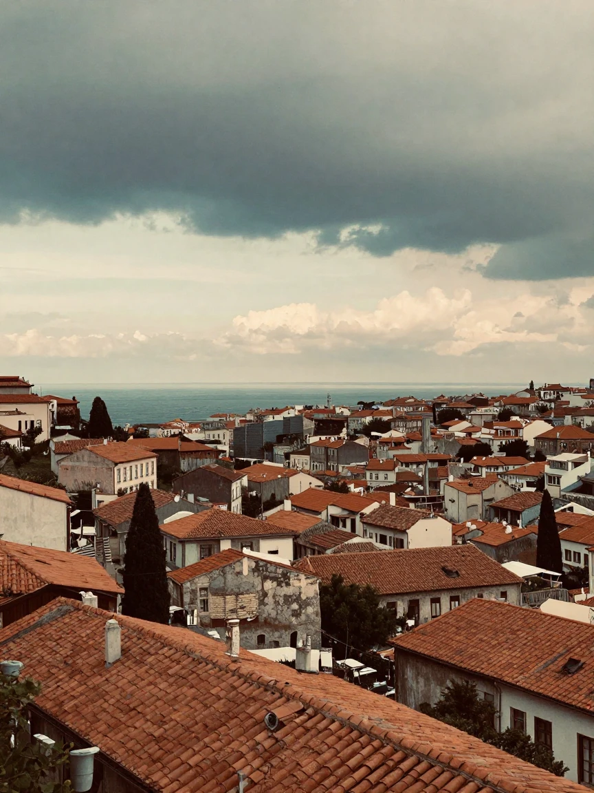 A hillside city view with terracotta rooftops stretching to the sea, under a pale winter sky, under a darkening storm sky, in the mild days of early autumn, in soft muted pastels, from a slightly elevated vantage point.