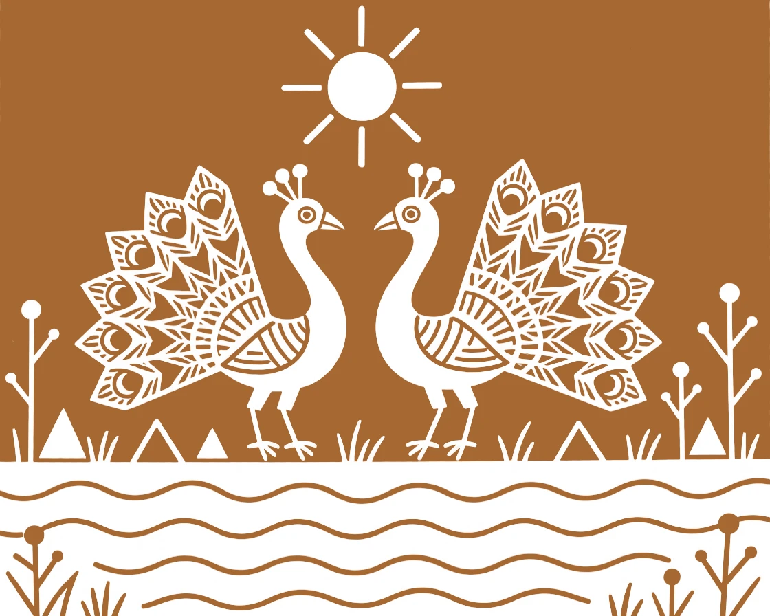 A pair of peacocks standing at the edge of a lake.