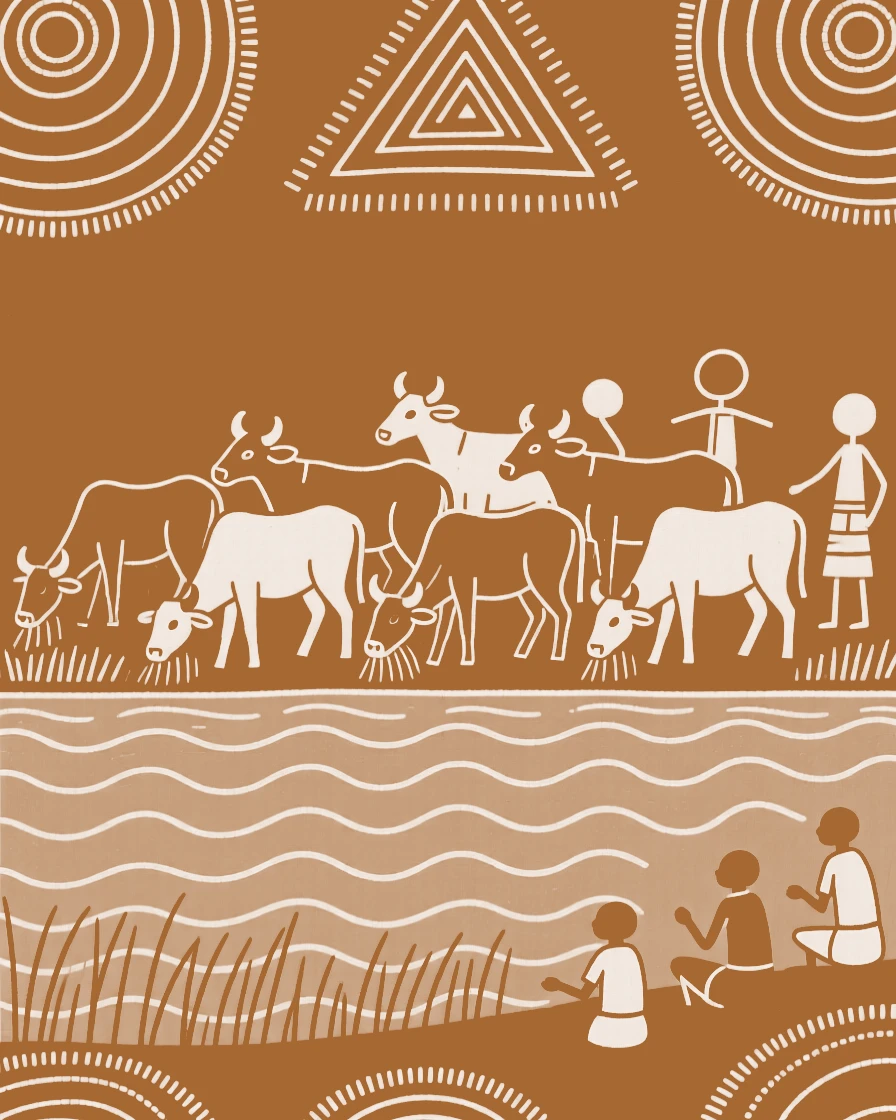 A herd of grazing cattle standing at the edge of a lake.