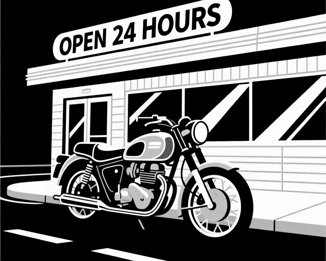 A vintage motorcycle parked outside a roadside diner.