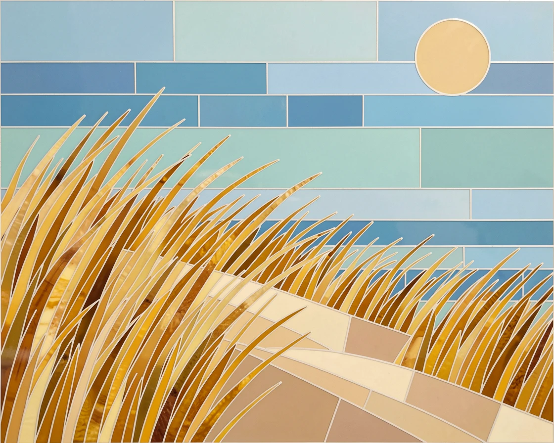 A windswept coastal dune covered in tall golden grass.
