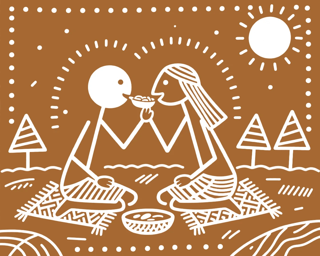 Two sweethearts feeding each other during a festive meal.