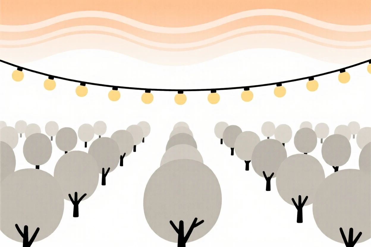A summer heat haze covering an orchard as a string of holiday lights appears in the distance, full of cozy anticipation.