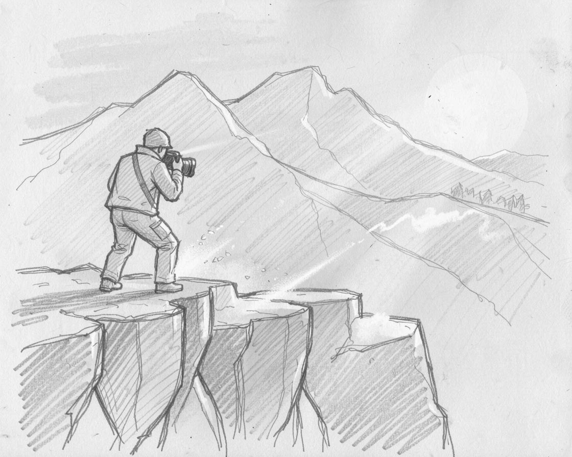 A photographer capturing a sunset from a cliff edge, against a dramatic mountain backdrop, with spray catching the sunlight.