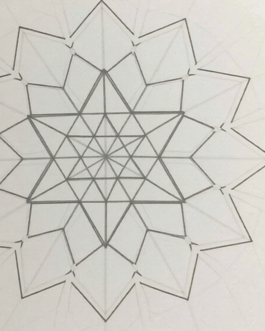 An intricate mandala featuring a central star pattern