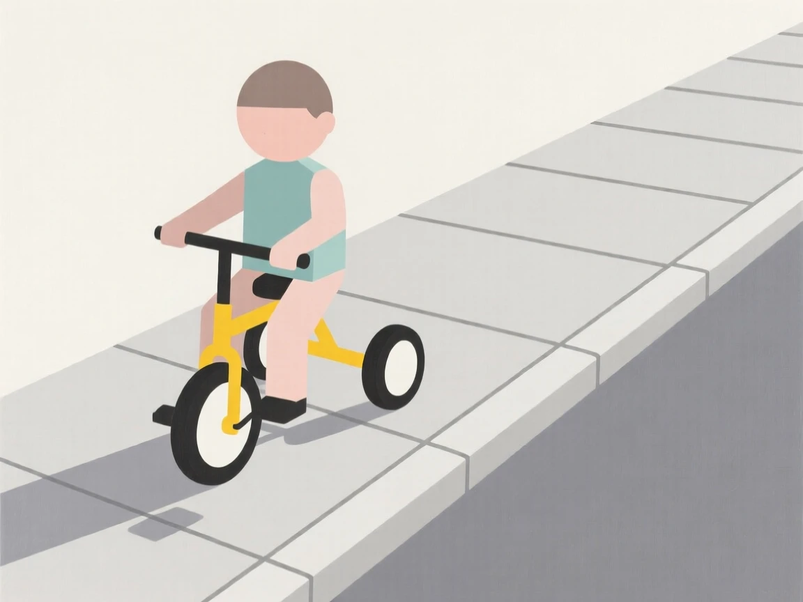 A young child riding a tricycle down a sidewalk