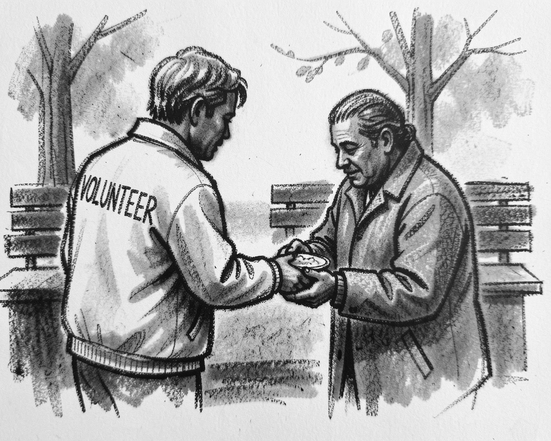 A volunteer handing food to someone in need, in a moment of quiet togetherness.