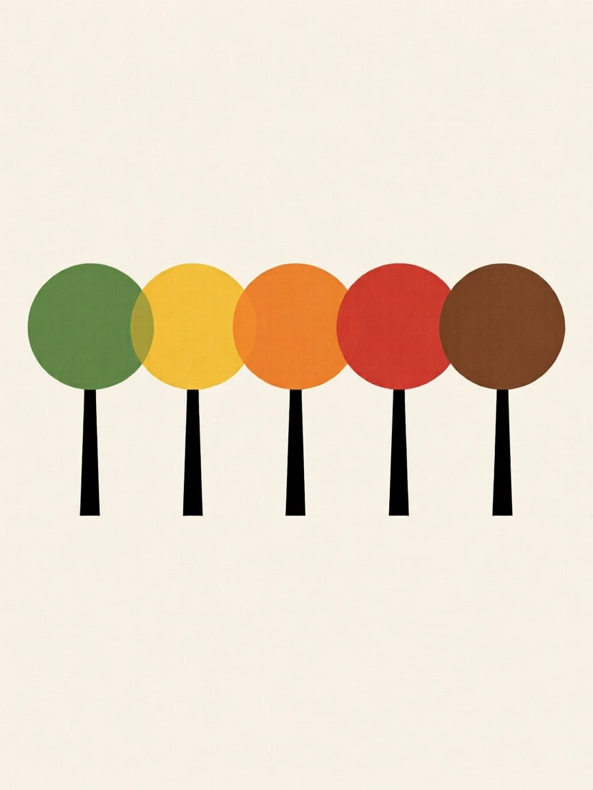 A row of trees changing color in autumn