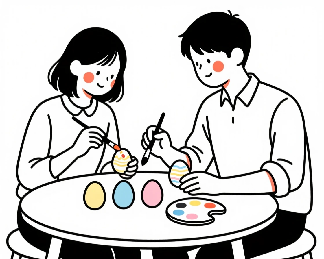 A young couple decorating eggs for Easter.
