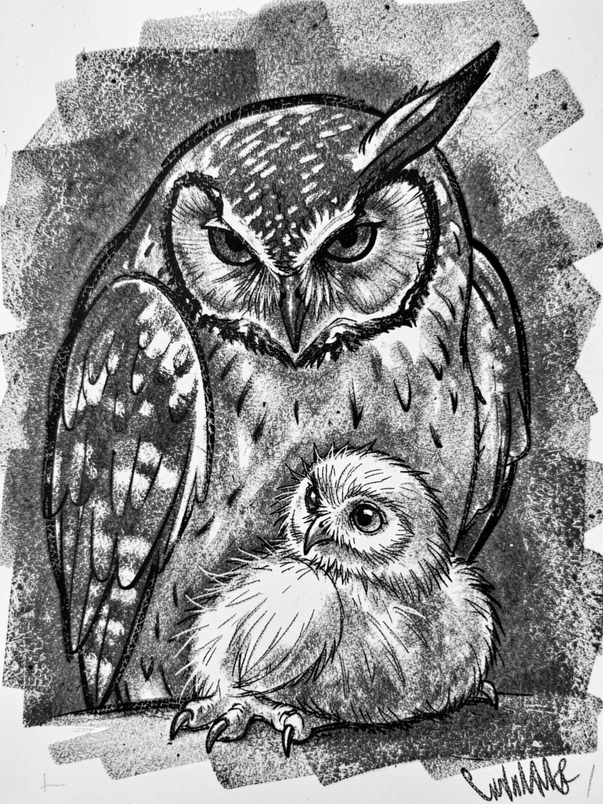 A great horned owl grooming its young with gentle care.