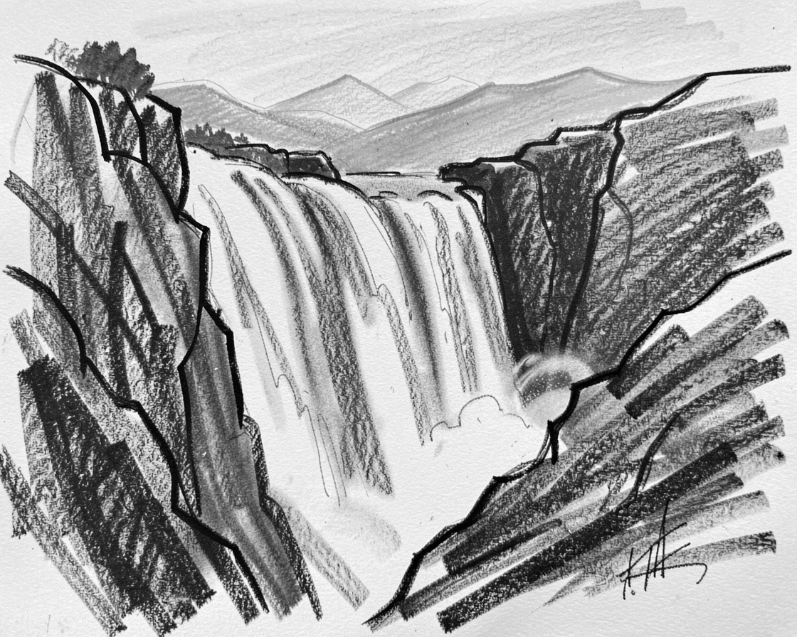 A towering waterfall with distant mountains fading into blue haze.