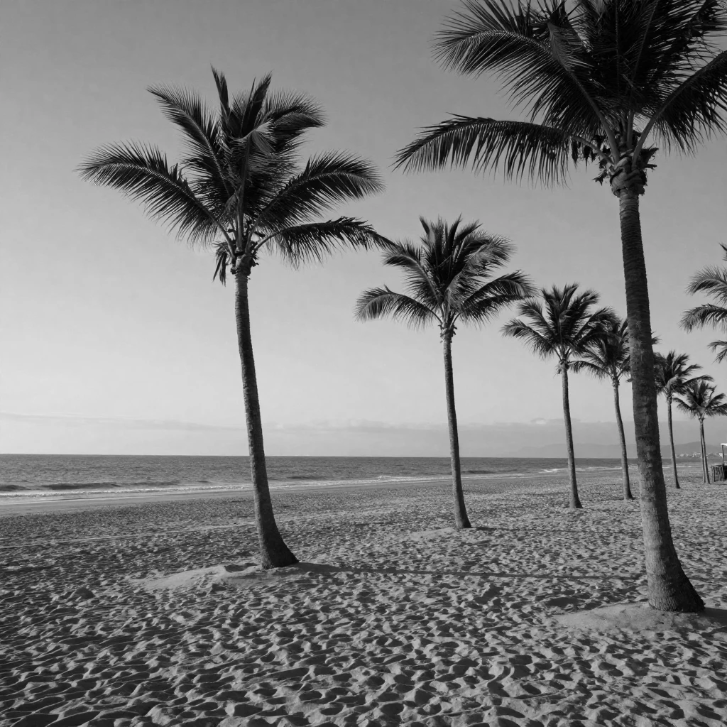 A row of palm trees sways gently in the ocean breeze along a sun-drenched beach.
