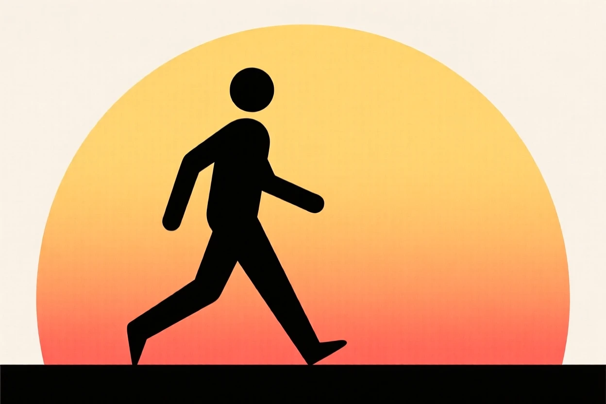 A person walking confidently into a sunrise