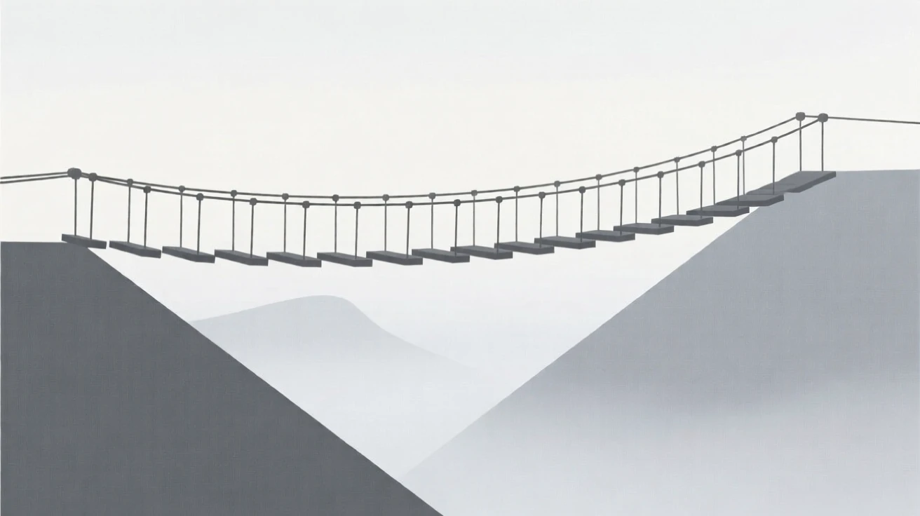A rope bridge leading across a misty valley