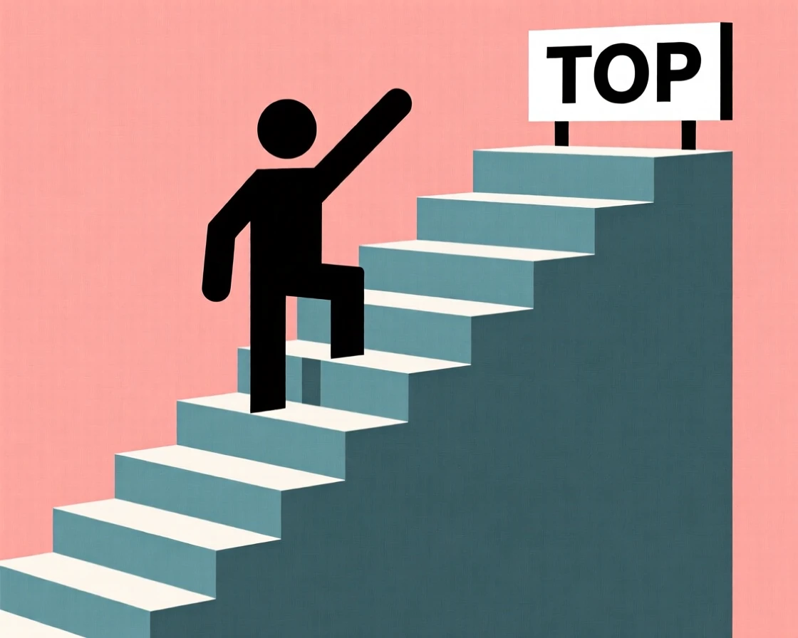 A person reaching the top of a long staircase